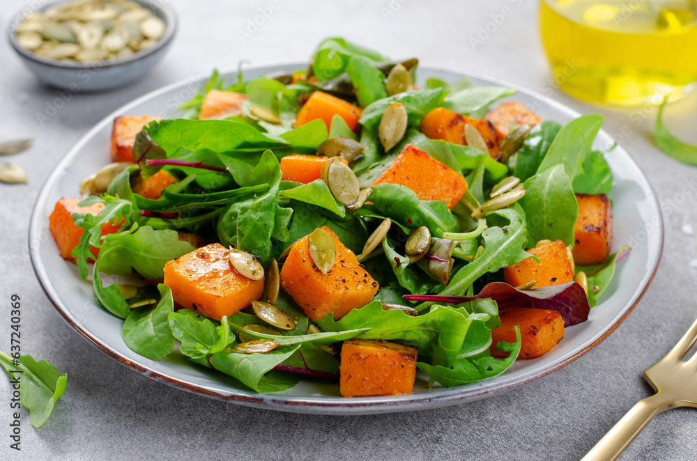 Pumpkin Salad with Arugula and Pumpkin Seeds, Salad Mix with Roasted Pumpkin, Fresh Vegan Autumn Salad