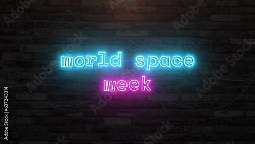 World space week with neon text effect in wall background. Seamless looping video