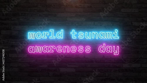 World tsunami awareness day with neon text effect in wall background. Seamless looping video