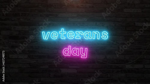 Veterans day with neon text effect in wall background. Seamless looping video
