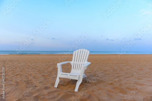 one chair  beach  dawn  ocean  sea  sky  sand