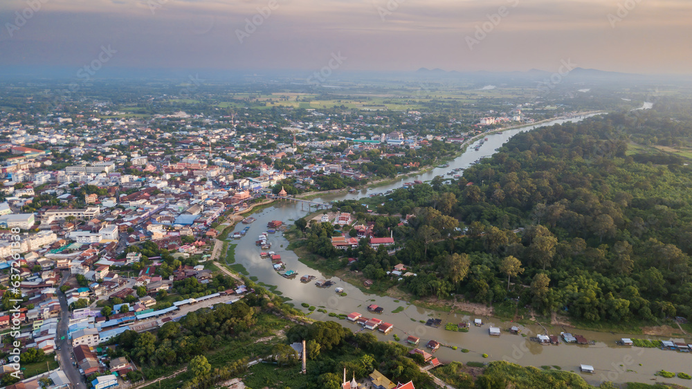 Aerial View landscape water flowing and life of thai people fishery, Aerial Drone View of Sakae Krang River and home villages near the river at Uthai Thani Province in Thailand