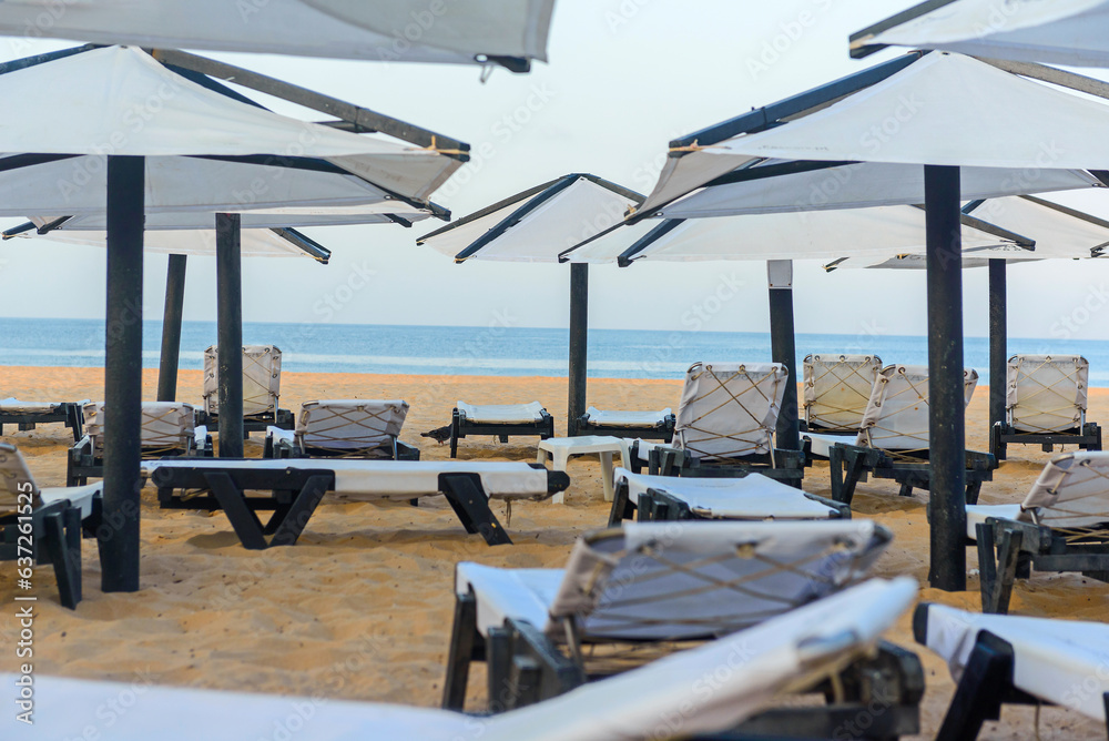 Sunbeds, Beach loungers, Relaxation, Beachside, Umbrellas, Sunbeds, Beach loungers, Relaxation, Beachside, Umbrellas,