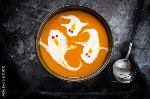 Pumpkin Soup, Halloween Cream Soup on Dark Cobweb Background