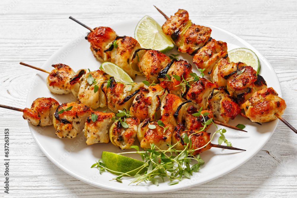 chicken souvlaki with thyme and lime on plate chicken souvlaki with thyme and lime on plate
