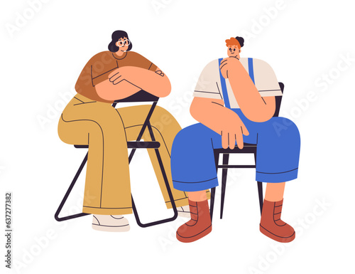 Woman and man friends, sitting on chairs, speaking, talking, looking at each ...