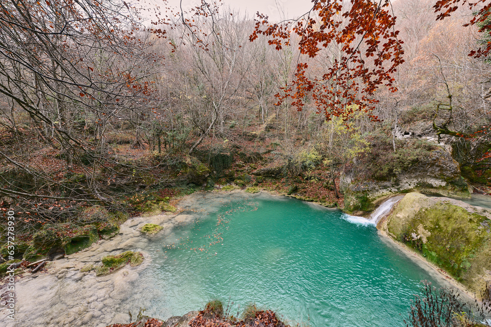 Turquoise water in the source of the Uderra River natural Park Urbasa ...