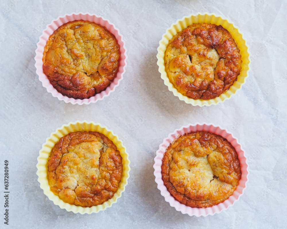 Delicious freshly baked gluten free berry muffins made with coconut flour with no added sugar, top view. Healthy sweet food, flat lay style. Delicious freshly baked gluten free berry muffins made with coconut flour with no added sugar, top view. Healthy sweet food, flat lay style.