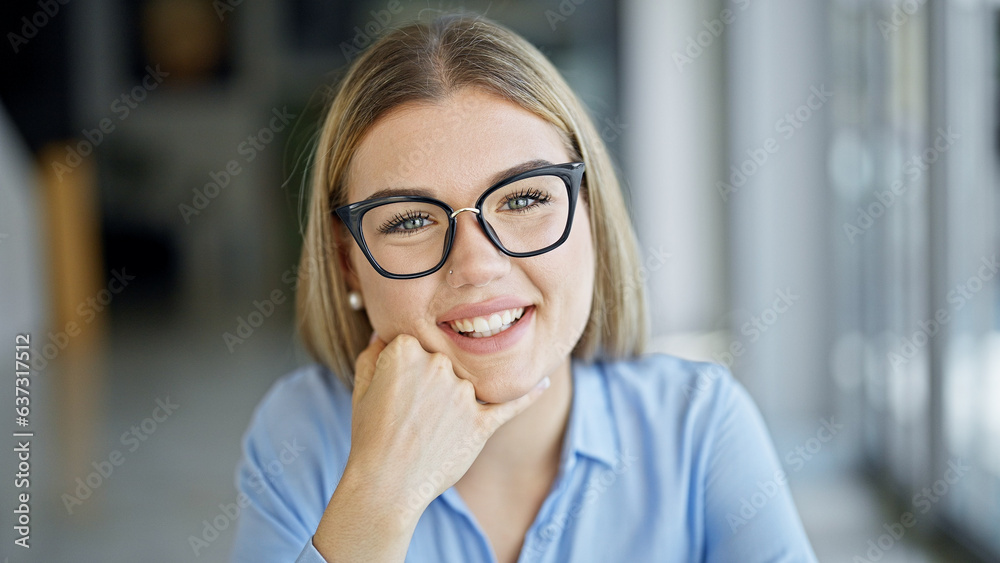 Young blonde woman business worker smiling confident at office Young blonde woman business worker smiling confident at office