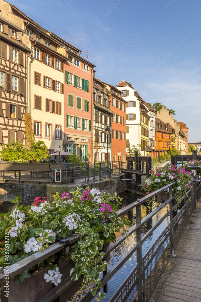 Strasbourg, France - June 19, 2023: Traditional half-timbered houses on the picturesque canals of La Petite France in the medieval town of Strasbourg, UNESCO World Heritage Site, Alsace, France