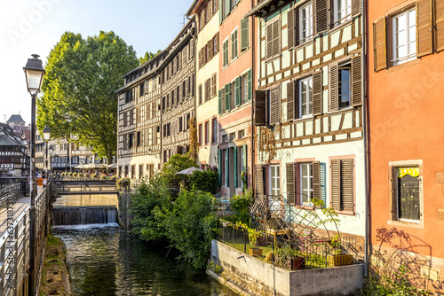 Strasbourg, France - June 19, 2023: Traditional half-timbered houses on the picturesque canals of La Petite France in the medieval town of Strasbourg, UNESCO World Heritage Site, Alsace, France