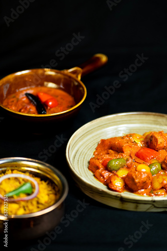 Delicious and colorful Indian food on a black background photo
