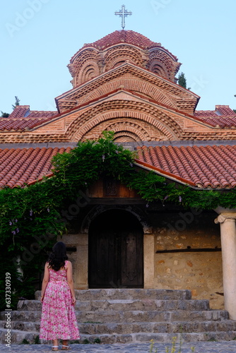 Church of Virgin Mary Peribleptos of Ohrid and a woman visiting