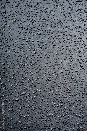 raindrops on metal surface in rainy days