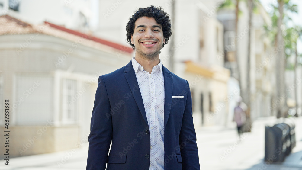 Young latin man business worker smiling confident standing at street Young latin man business worker smiling confident standing at street