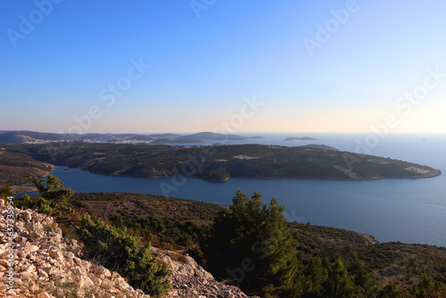Beautiful hills in Primosten, Croatia with rocks and various Mediterranean plants.