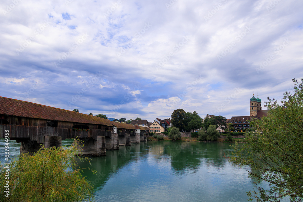 The historic old wooden bridge between Germany and Switzerland over the Rhine at Bad Säckingen The historic old wooden bridge between Germany and Switzerland over the Rhine at Bad Säckingen