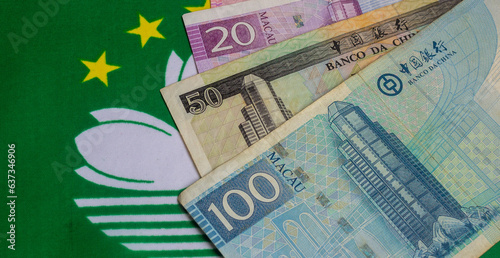 macanese pataca banknotes and the national flag photo