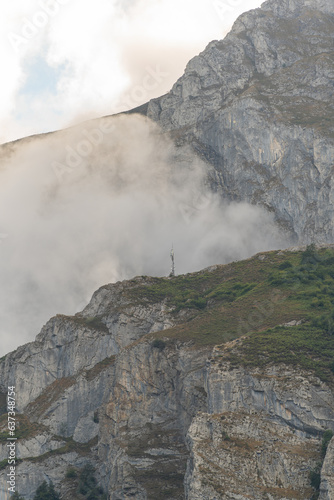 Mountain in northern Spain during summer with clouds and an antenna