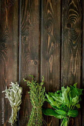 Fresh green garden herbs bunches for cooking  top view