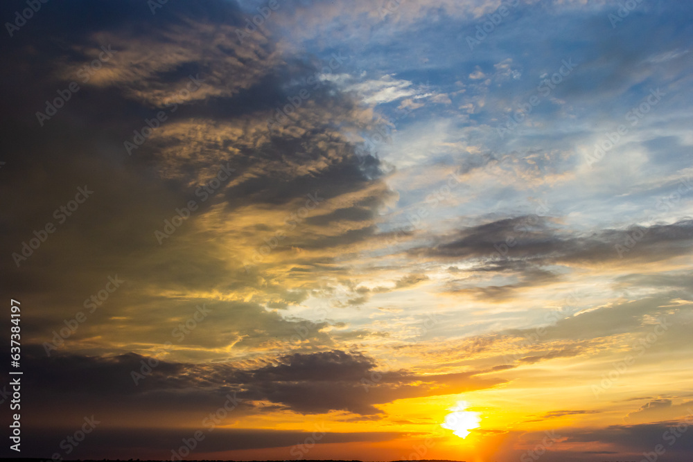 Obraz premium sunset sky with multicolor clouds. Dramatic twilight sky background