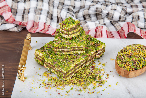 Delicious Turkish Delight with pistachios. Assortment of Turkish delight with pistachio. Mixed Turkish Delight. local name Antep fistikli lokum. photo