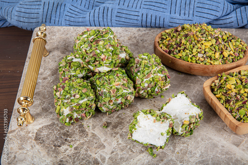 Delicious Turkish Delight with pistachios. Assortment of Turkish delight with pistachio. Mixed Turkish Delight. local name Antep fistikli lokum. photo