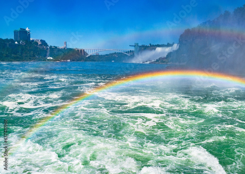 Huge rainbow and view on Bridal Veil Falls, Niagara Falls, part of Goat Island, Ontario, Canada. High quality photo
