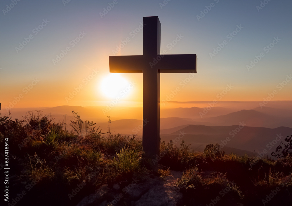 A Christian cross on a mountain at sunset