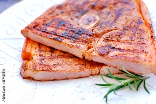 Принти на полотні Grilled ham steak with bone, cut in half,