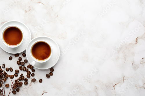 Cups of hot coffee and coffee beans on a white marble background