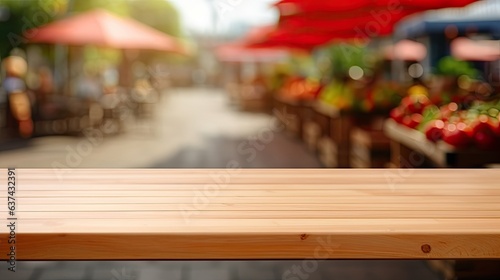 empty wooden table in modern style for product presentation with a blurred market place in the background