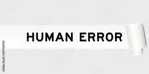 Ripped gray paper background that have word human error under torn part