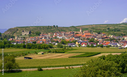 Look at Vogtsburg-Burkheim with church and castle ruins. Kaiserstuhl, Baden-Wuerttemberg, Germany, Europe