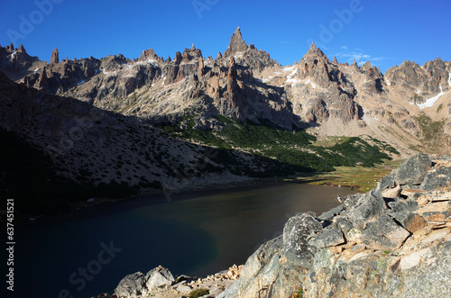 Impressive mountain landscape with lake, Nahuel Huapi National Park, Toncek lagoon surrounded by steep granite rock formations Torre Principal peak of Cerro Catedral, Nature of Patagonia, Argentina