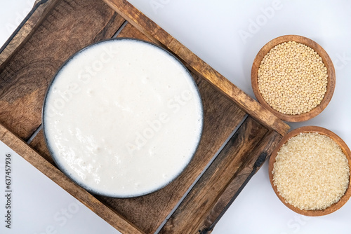 Selective focused image of fermented batter for idli and dosa in an isolated background. Idly and dosa batter in a bowl for fermentation, used to prepare the dosa and idli..