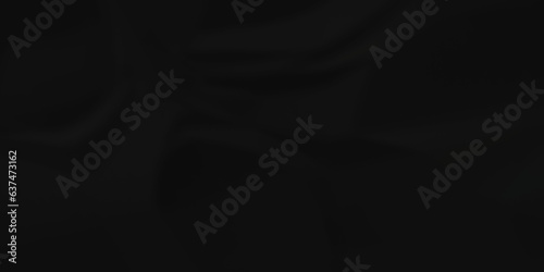 Dark crumple black paper wrinkled poster template ,blank glued creased paper texture background. black paper crumled backdrop background. used for cardboard and clarkboard.