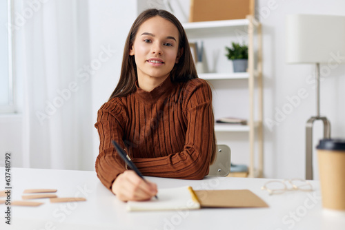 schoolgirl girl exam education desk student preparation table notebook teenager