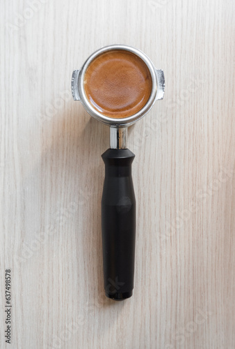 Espresso coffee in a handle