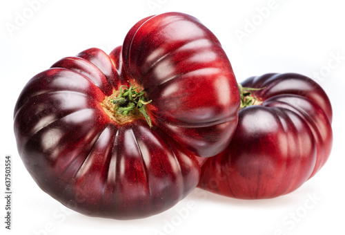 Fotografie Ripe black or purple tomatoes isolated on white background.