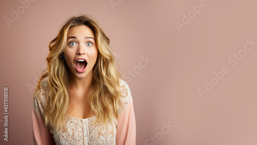 Young blonde woman in expressive pose  surprised