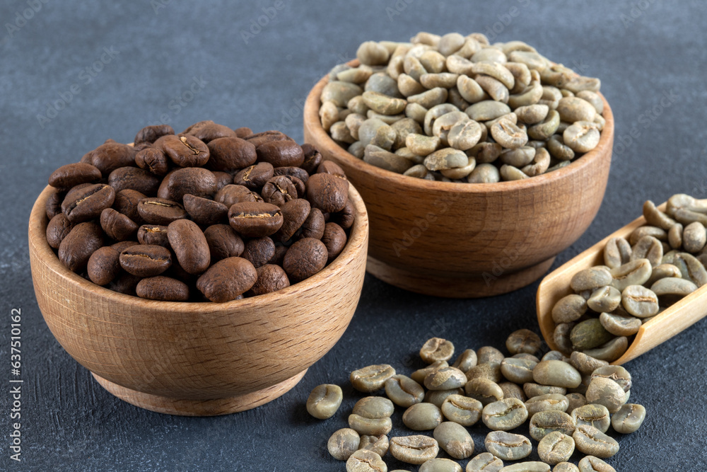 Green coffee with roasted coffee beans on dark background Green coffee with roasted coffee beans on dark background