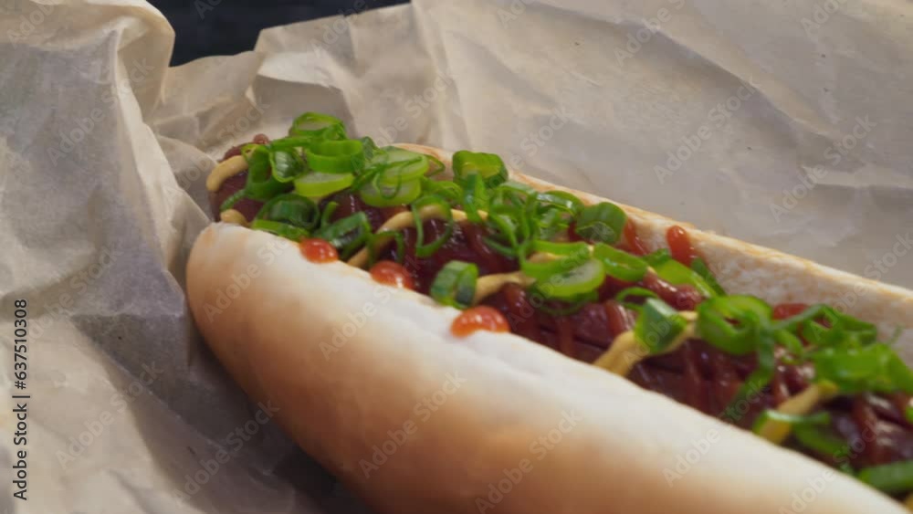 Closeup of a freshly cooked delicious hot dog in the restaurant