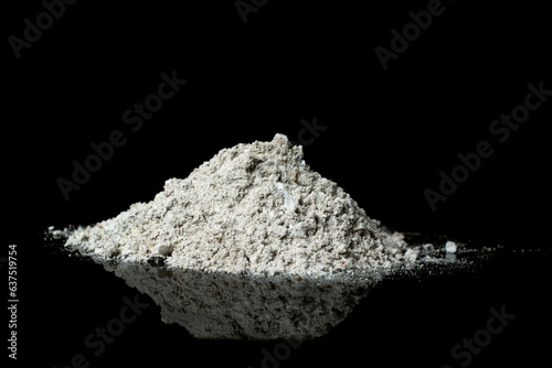 Fotografija Pile of wood ash isolated on black background.