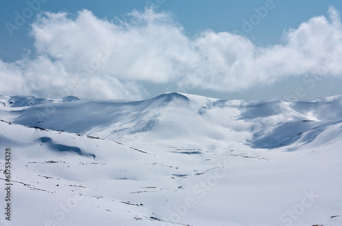 Clouds on a sunny day in distance in backcountry in Charlotte's Pass ski resort in Australia