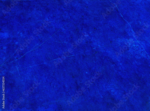 polished surface of the deep blue mineral gem stone, top grade (clear) Lapis Lazuli (lazurite) photo