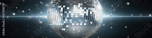 Disco ball scatters light in a dark room
