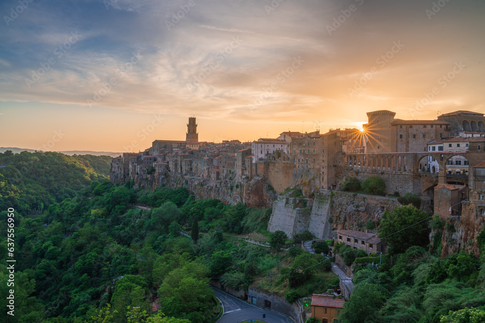 Italian medieval city at sunset, Pitigliano in the province of Grosseto in southern Tuscany, Italy