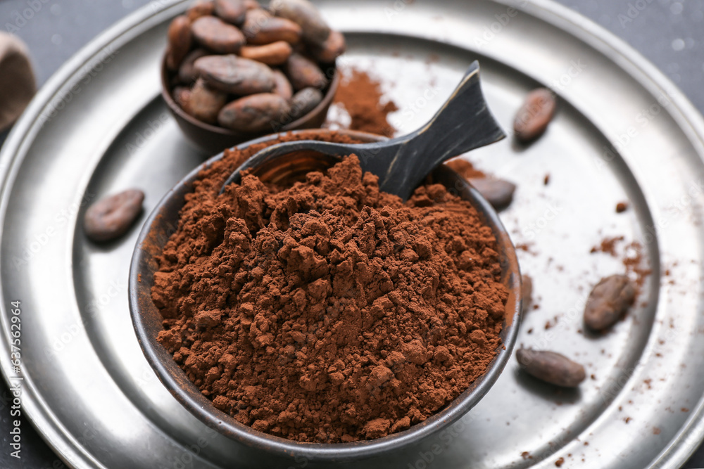 Bowl with cocoa powder on table Bowl with cocoa powder on table