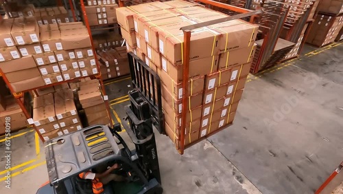 Birdseye View Of Forklift Truck With Boxes In Warehouse